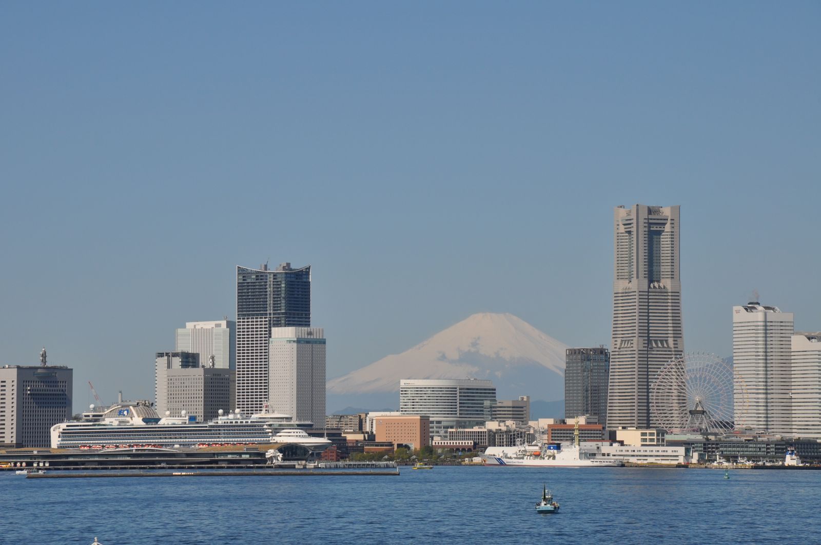 Yokohama waterfront towers with Mount Fuji in the distance, a Japanese gateway for transpacific cruises